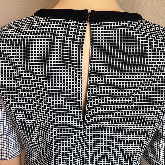 BCBGENERATION Black & White Checkered
Sheath Dress with Sheer V Neck Size XS - Picture 7 of 12